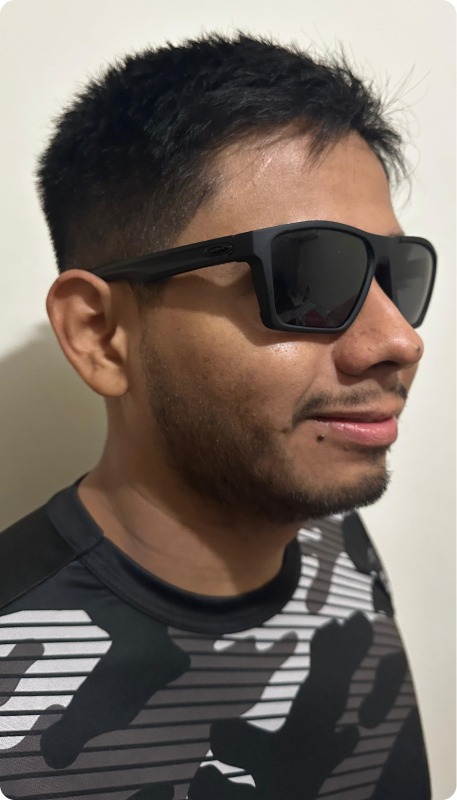 original image of young man wearing black glasses and smiling